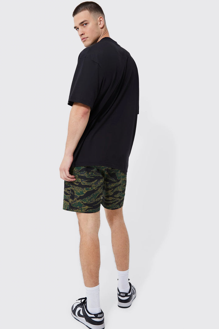 BOOHOOMAN ELASTIC WAIST COMFORT LEAF CAMO SHORT LENGTH