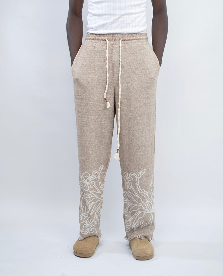 Giesto distressed hem woven pants with floral prints