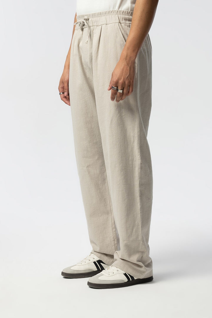 H&M COTTON/LINEN RELAXED FIT TROUSERS IN SAND