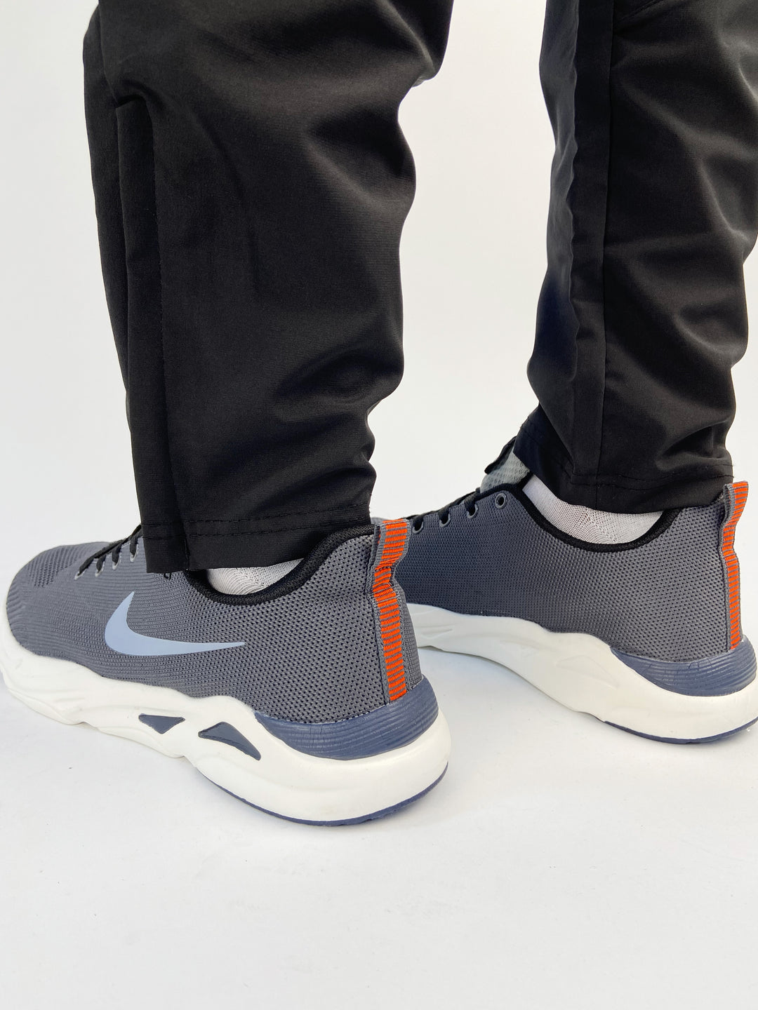 Nike air max trainers with blue logo and orange  back tab
