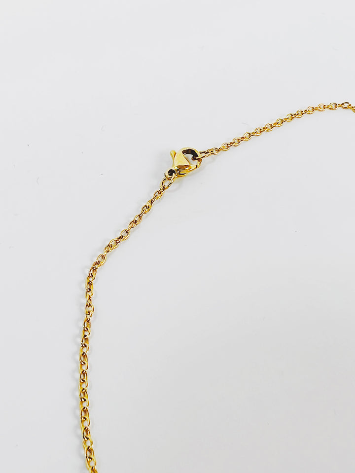 Garm Island Cherub necklace in gold