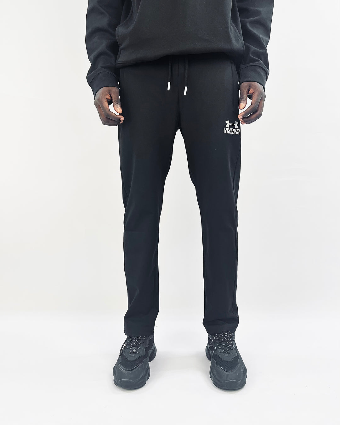 Under armour logo track pants in black