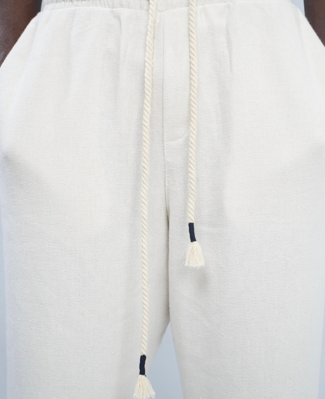 Giesto woven pants with distressed hem in black