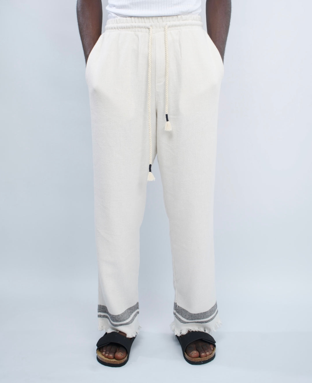 Giesto woven pants with distressed hem in black