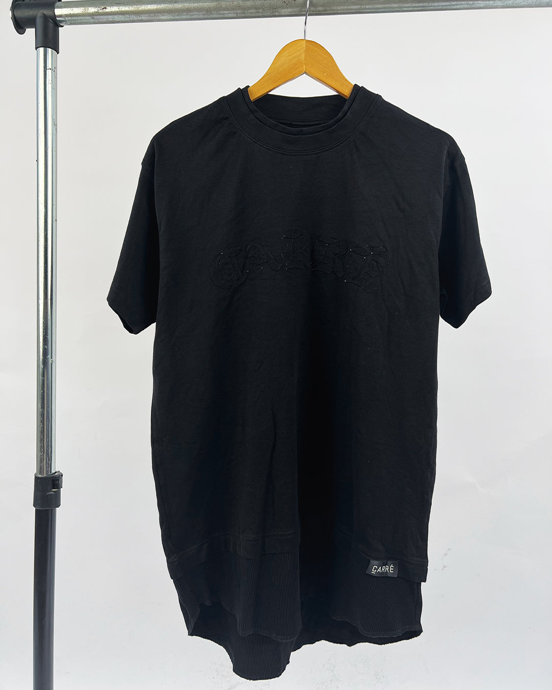 Carre Double Neck Curved Hem T-shirt in black