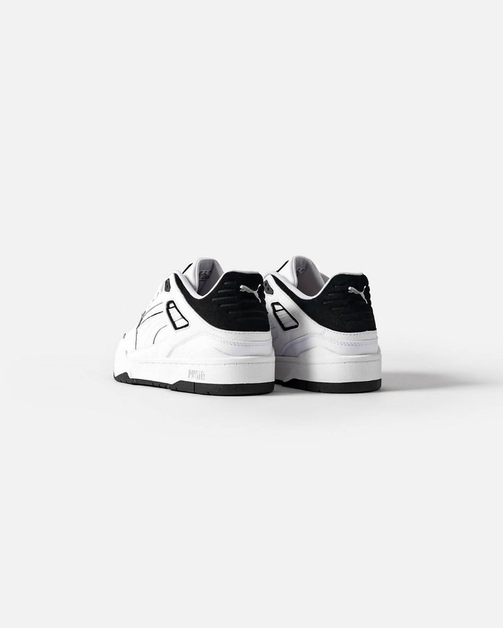 Puma slipstream trainers in white and black