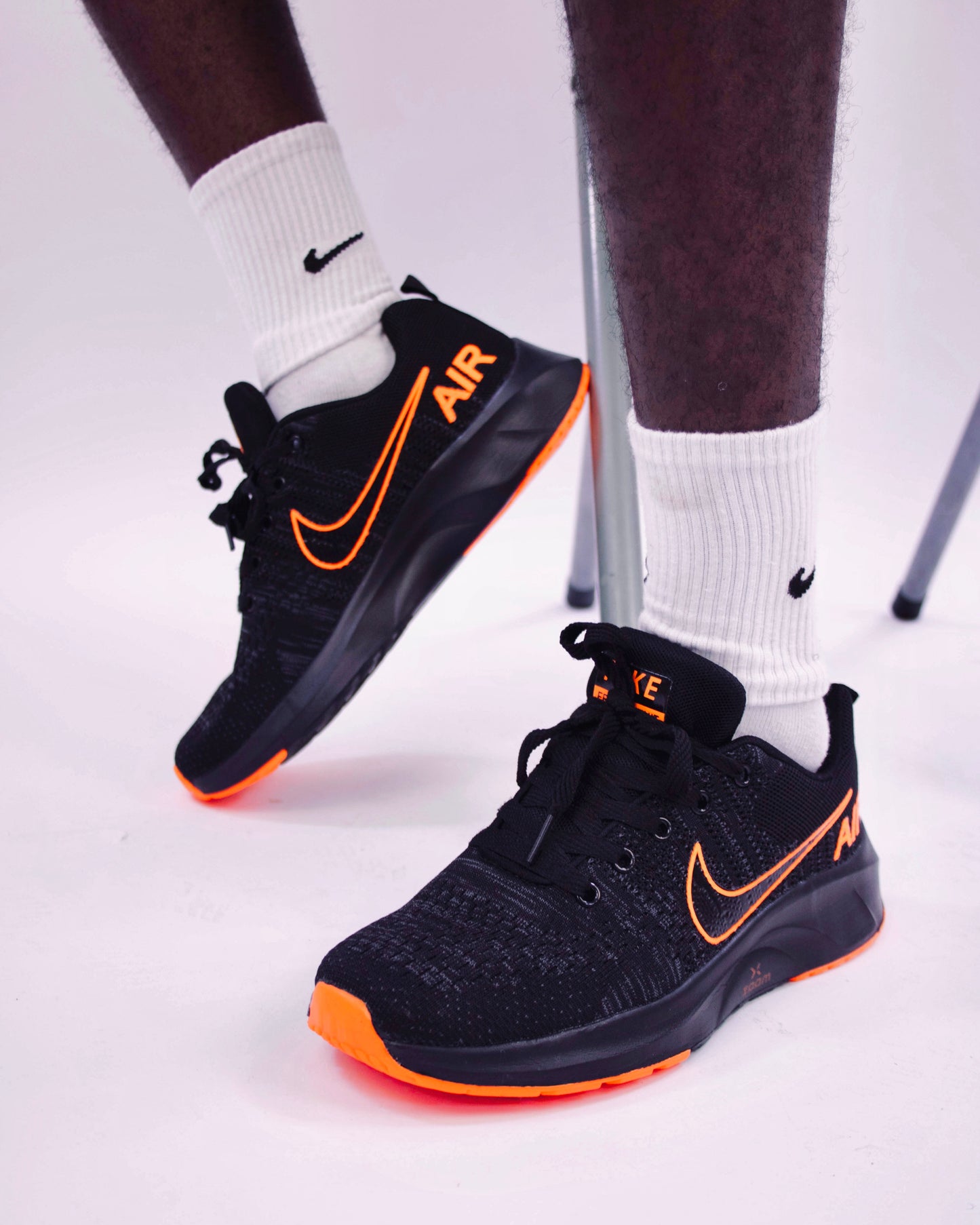 Nike air trainers in black and orange