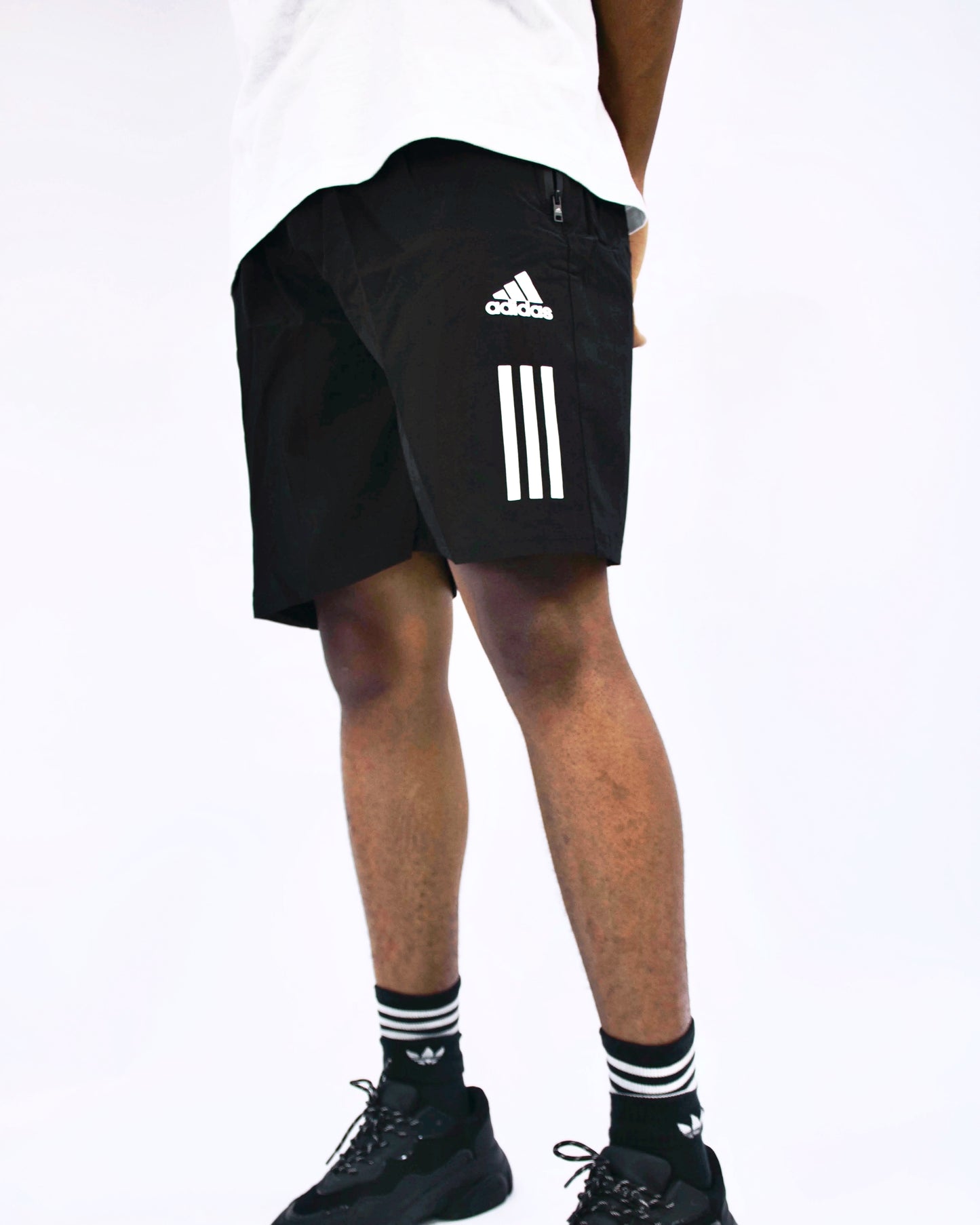 Adidas side stripe logo shorts in black