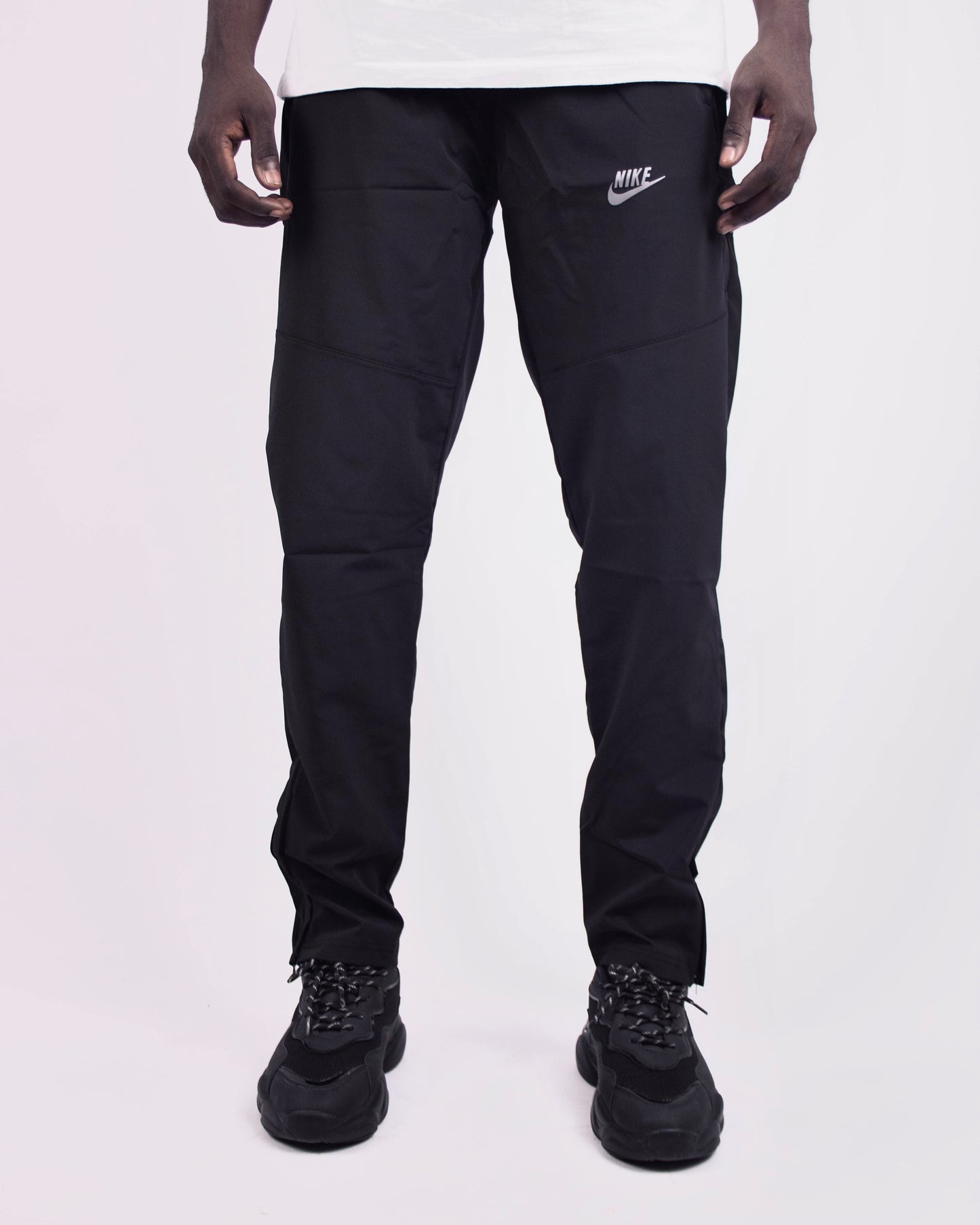 Nike Dri-fit track pants in black