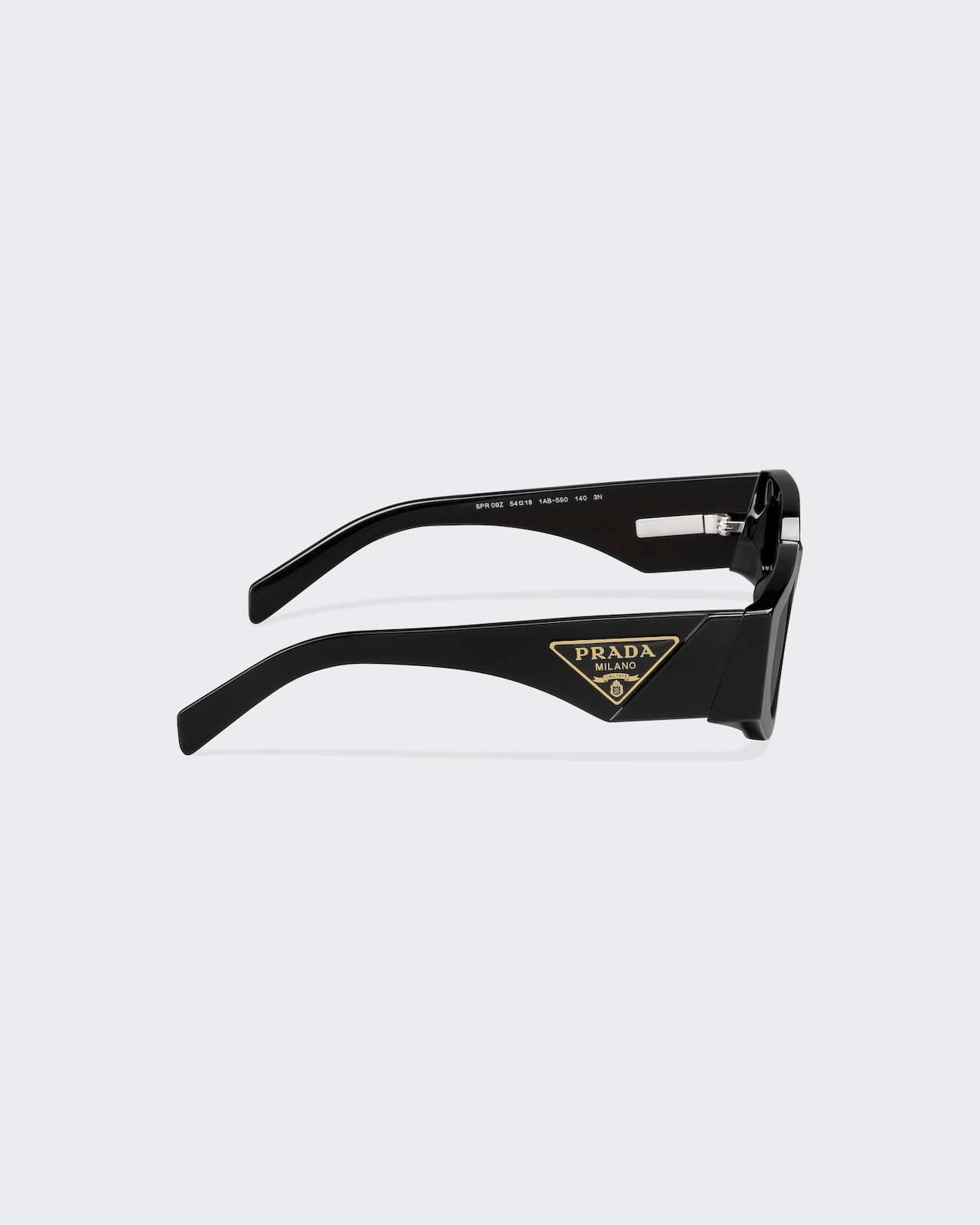 Prada Slate Gold Symbole Sun glasses in black