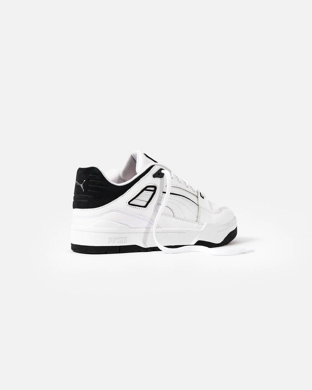 Puma slipstream trainers in white and black