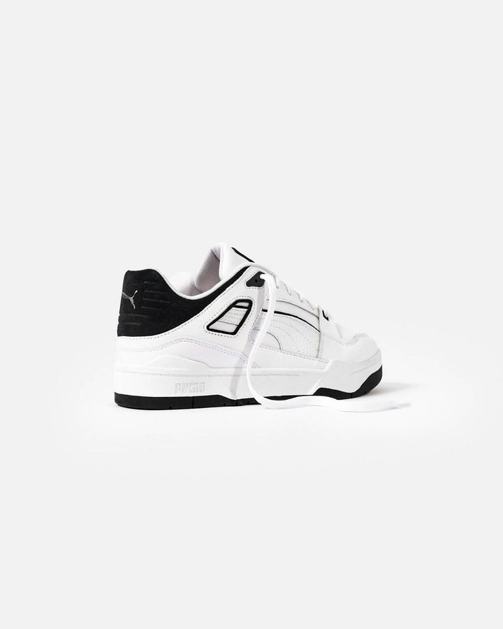 Puma slipstream trainers in white and black