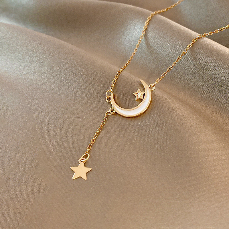 Moon and Star pendant necklace in gold