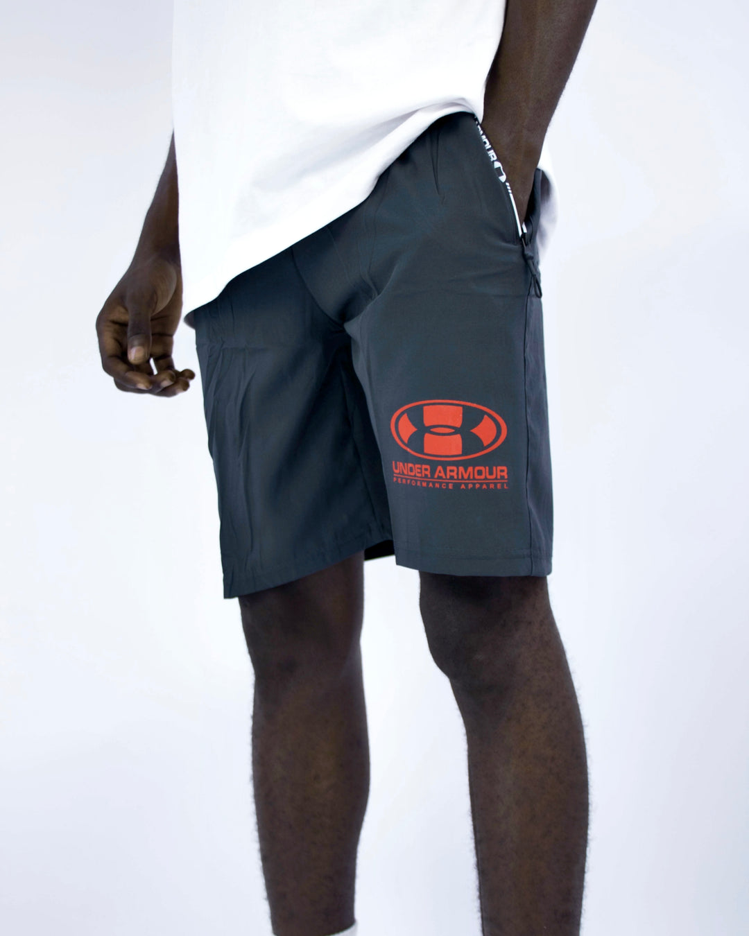 Under Armor Sports shorts with red patch