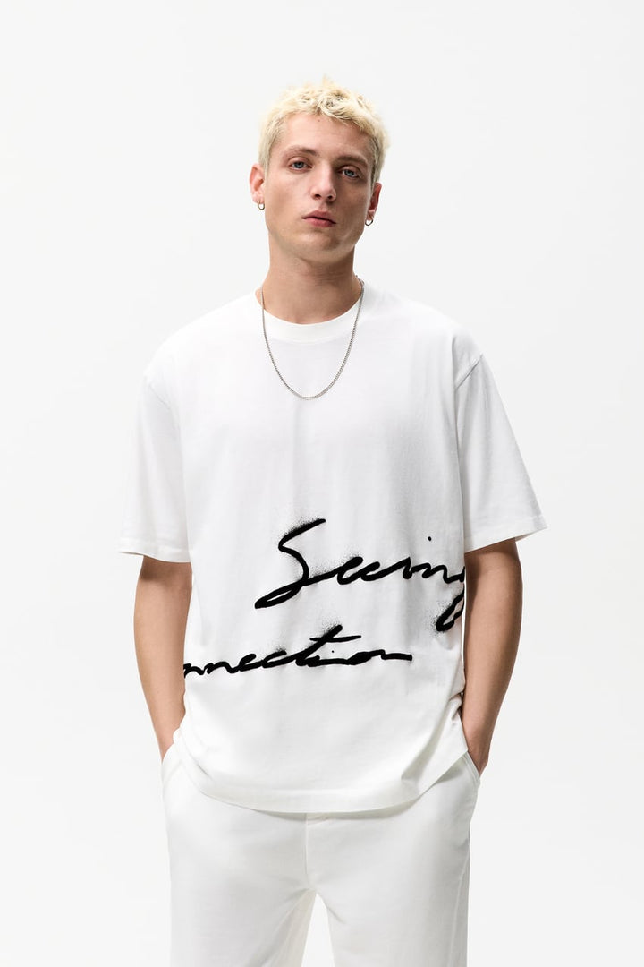 ZARA OVERSIZE T-SHIRT WITH SLOGAN IN WHITE