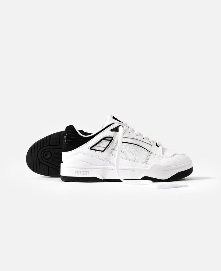 Puma slipstream trainers in white and black
