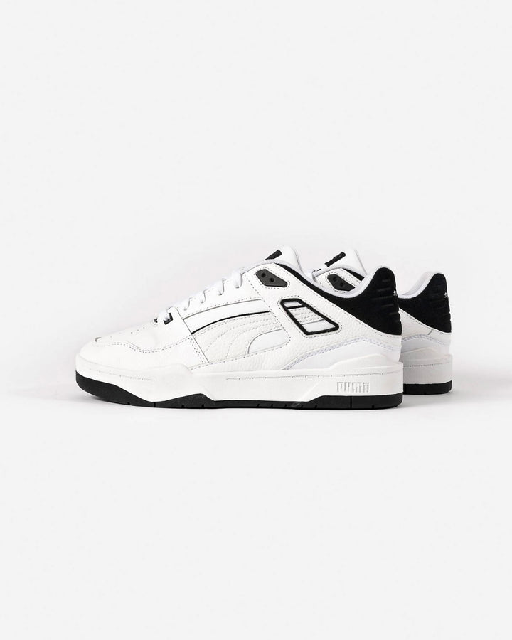 Puma slipstream trainers in white and black