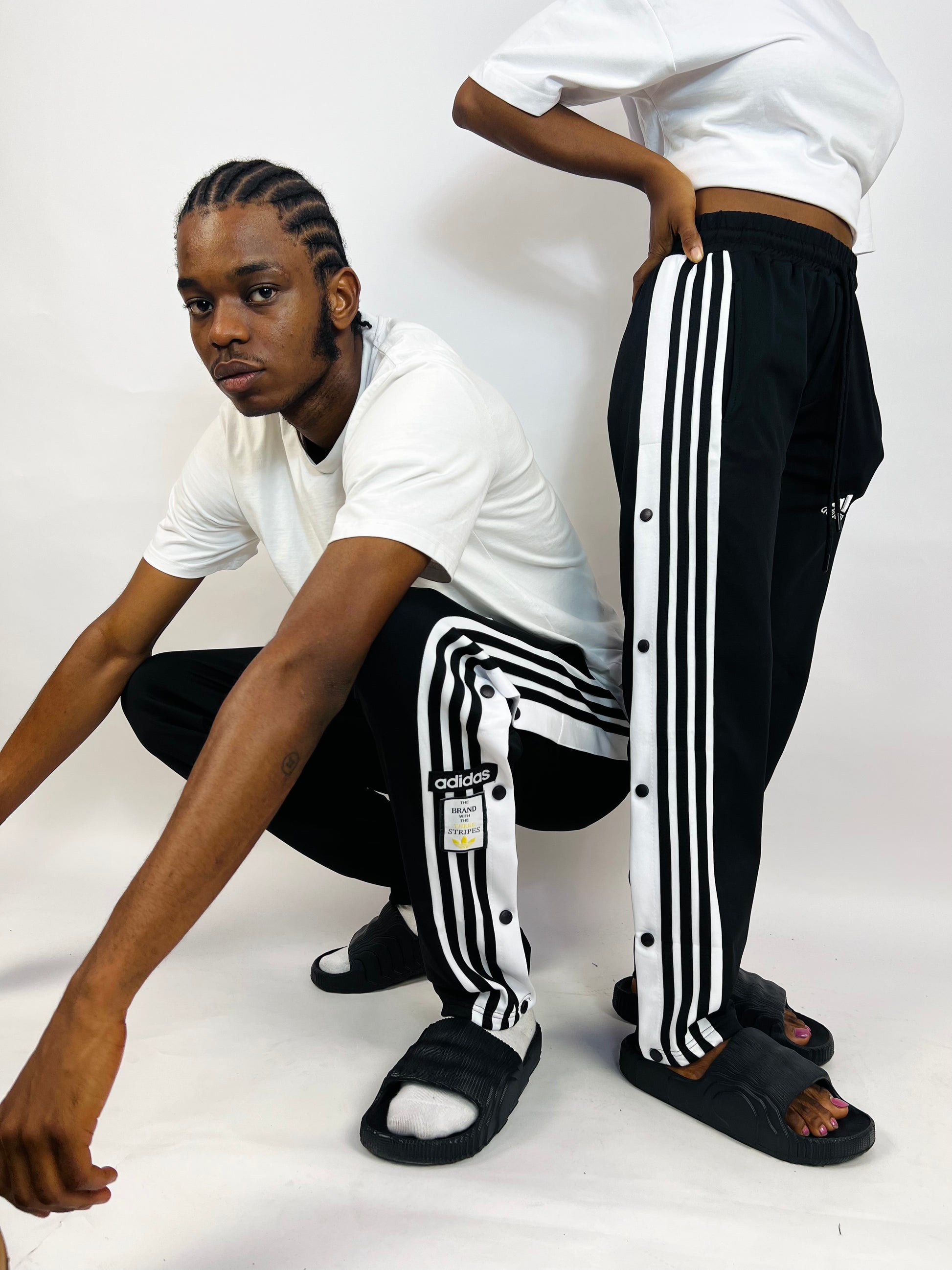 Adidas Unisex Tearaway jogger pants in black