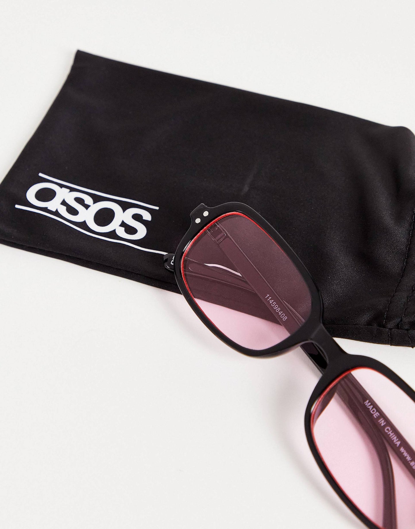 ASOS DESIGN rectangle sunglasses with pink lens in black