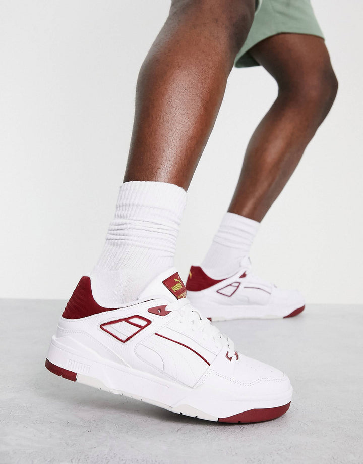 Puma slipstream trainers in white and red