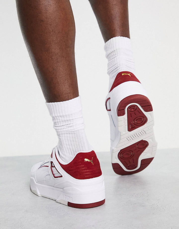 Puma slipstream trainers in white and red