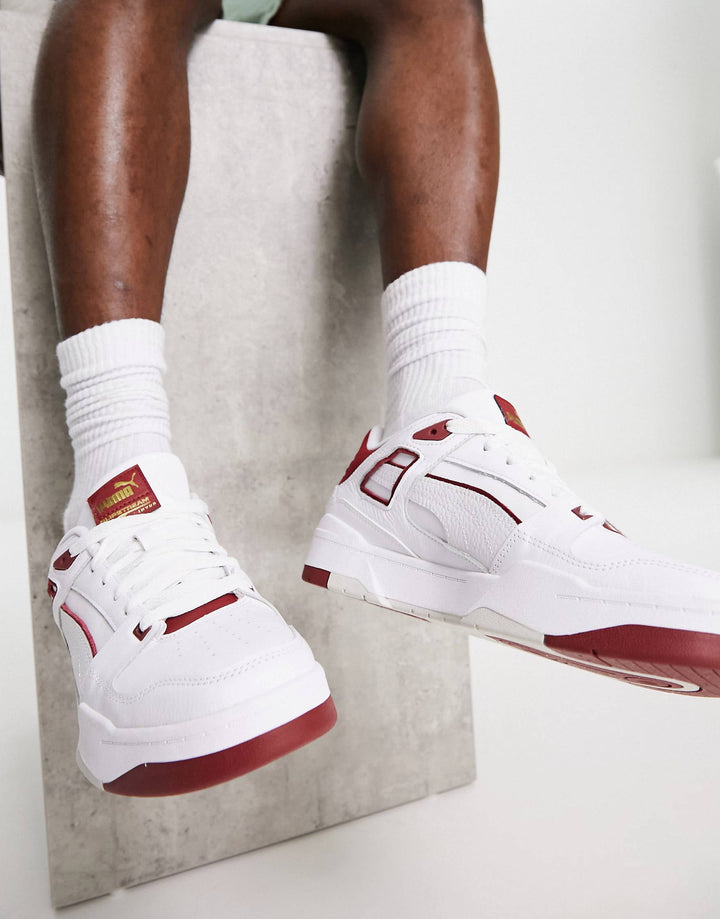 Puma slipstream trainers in white and red