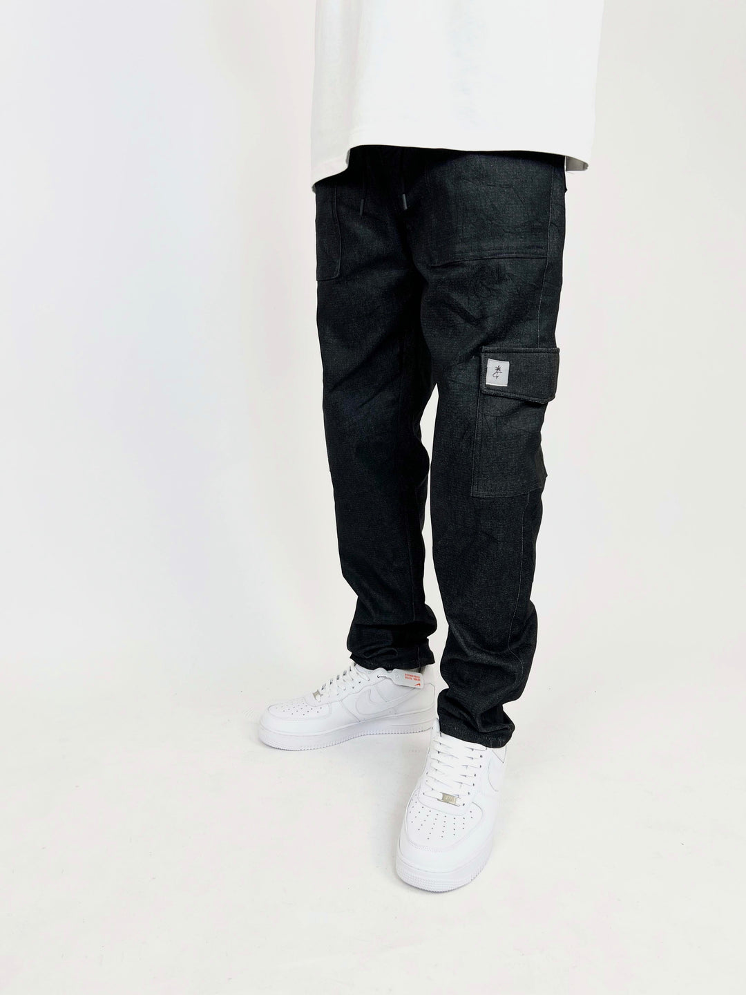 Garm Island patch cargo pants in black