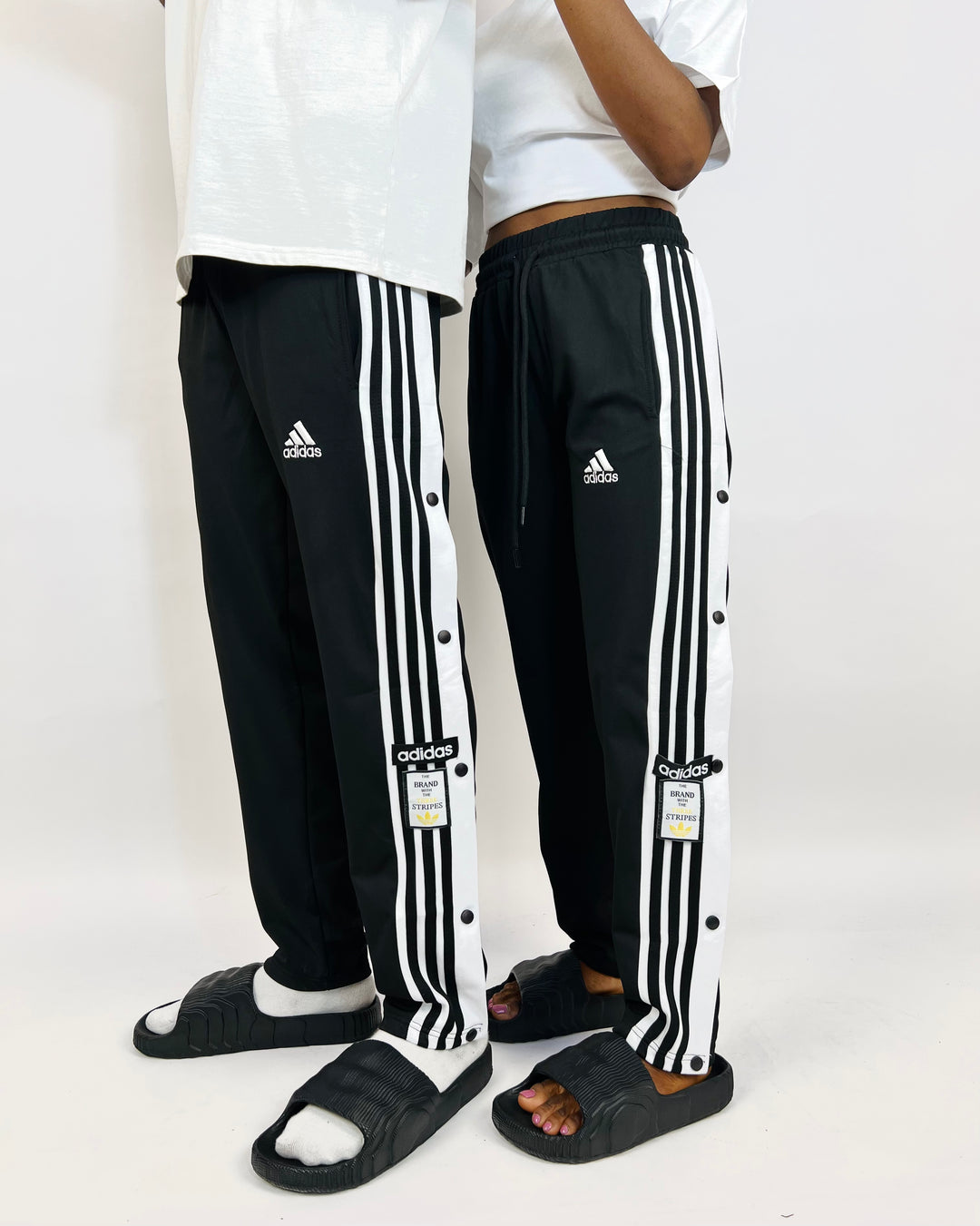 Adidas Unisex Tearaway jogger pants in black
