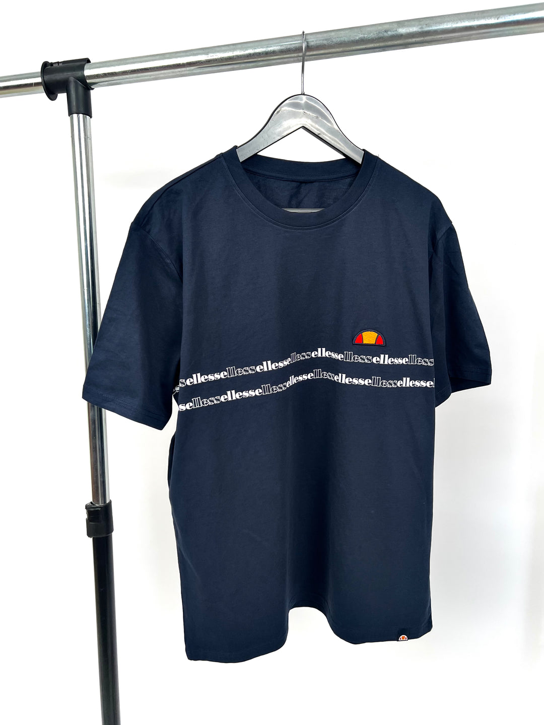 Ellesse Multi Text Print Badge T-shirt in Navy