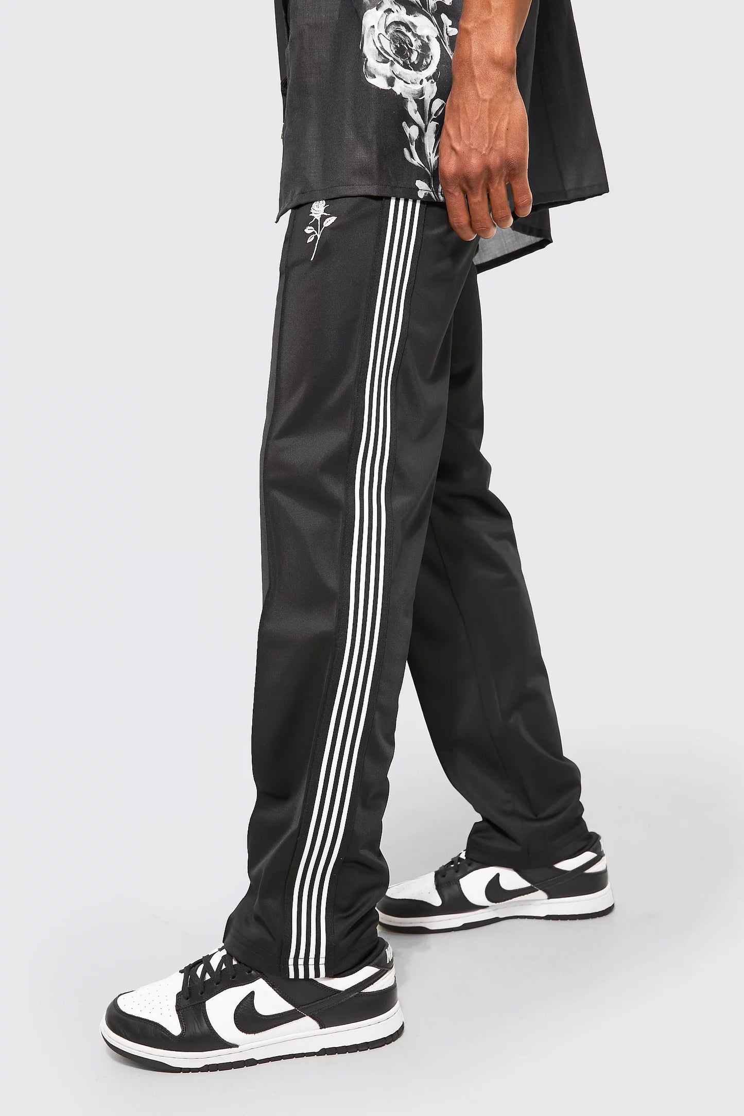 BOOHOOMAN REGULAR FIT ROSE EMBROIDERED TRICOT JOGGERS IN BLACK