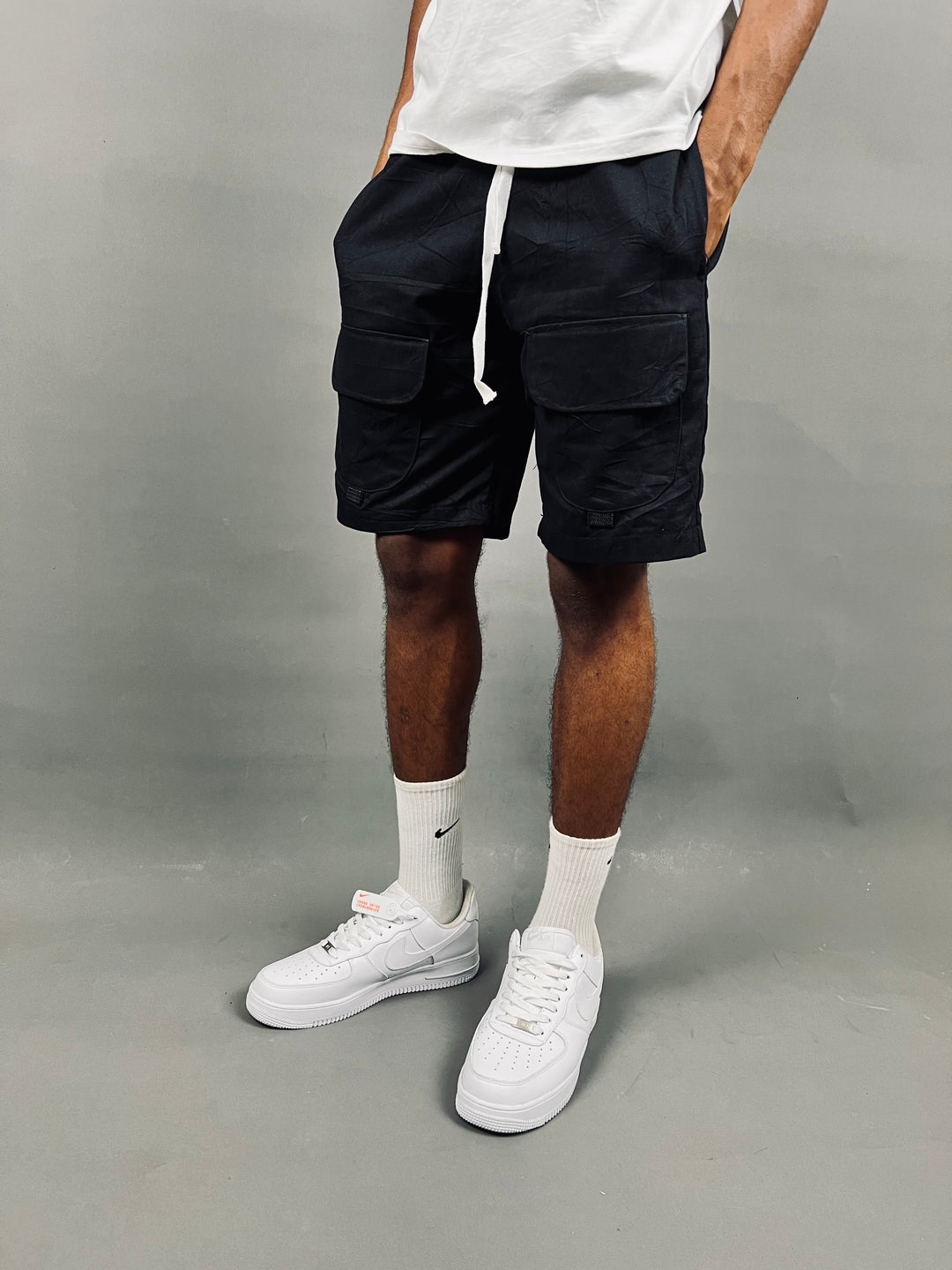 Tech cargo shorts in black