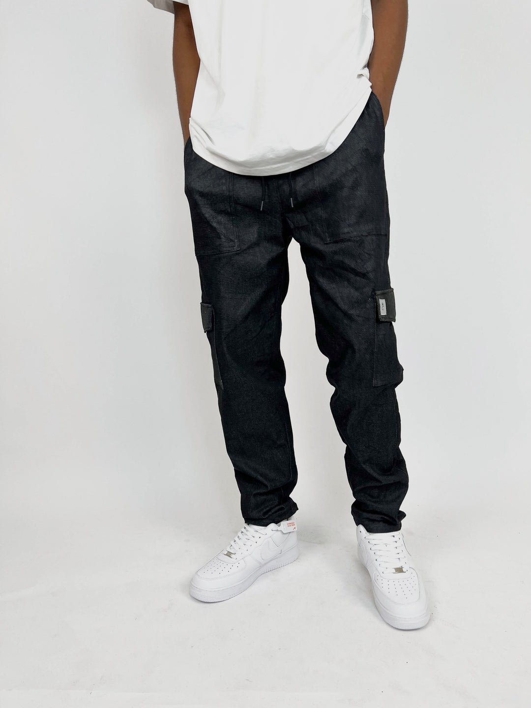 Garm Island patch cargo pants in black